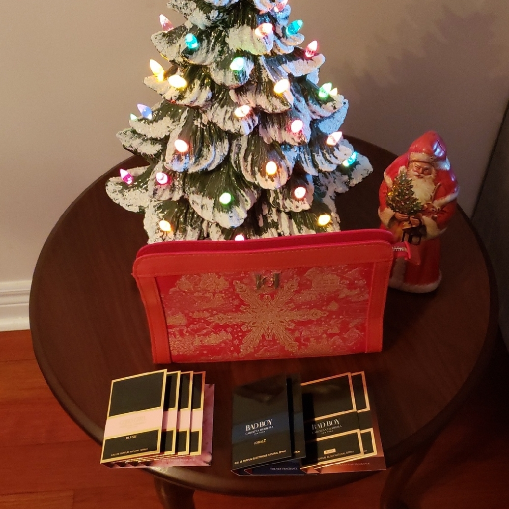Carolina Herrera Special Edition Red/Gold Cosmetic Bag & 8 fragrance samples.